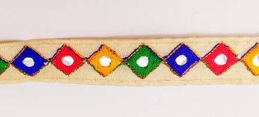 Wholesale Beige Cotton Fabric Mirrored Trim With Embroidery In Yellow, Blue, Red & Green Threads